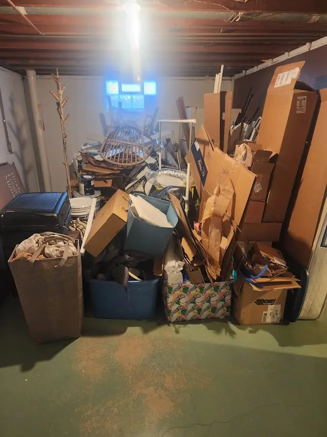 Roll-off dumpster container at job site for 20 Yard Dumpster Rental in Locust